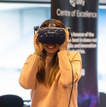 Lady with virtual reality headset on smiling