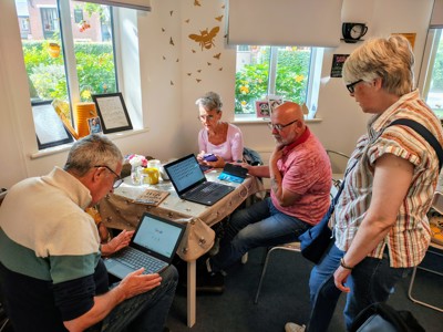 Digital Skills Session at The Hive with learners and a digital champion